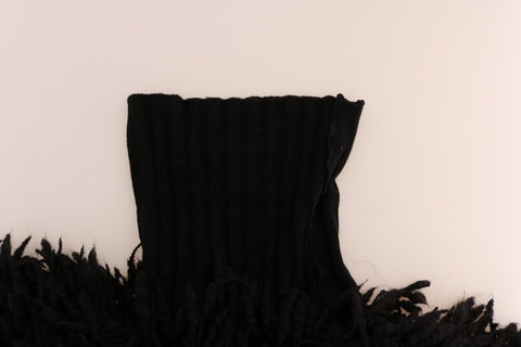 Black fringed wool pullover sweater by Dolce & Gabbana featuring a cozy fit and stylish fringe detailing.