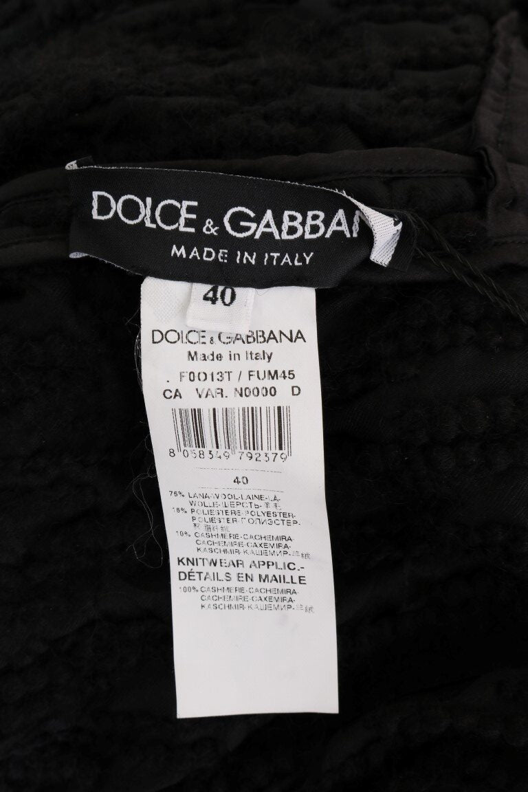 Dolce & Gabbana black wool pullover sweater with stylish fringes, showcasing a cozy knit design and textured details.