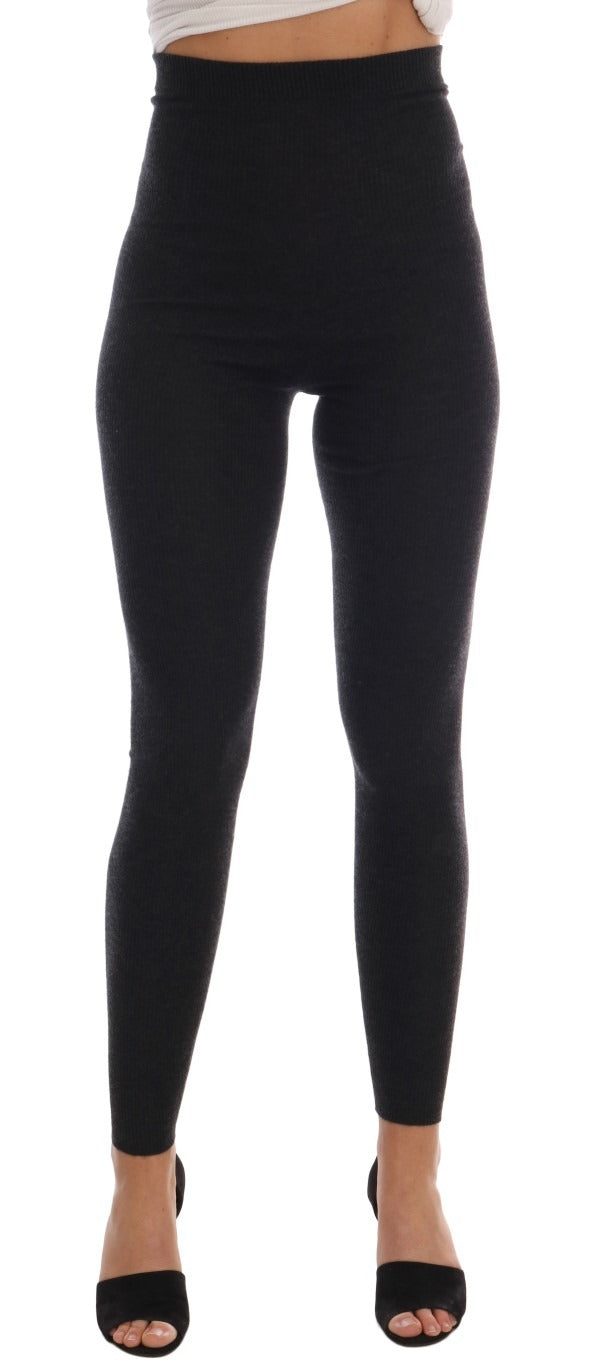 Gray cashmere ribbed stretch tights by Dolce & Gabbana lying flat, showing the textured ribbed design and smooth fit.
