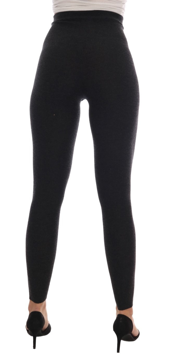 Gray cashmere ribbed stretch tights by Dolce & Gabbana, close-up of textured, fitted legwear with ribbed pattern.