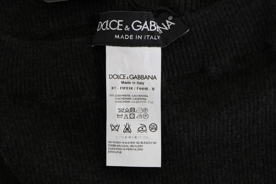 Gray cashmere ribbed stretch tights by Dolce & Gabbana, close-up showing soft fabric and ribbed texture.