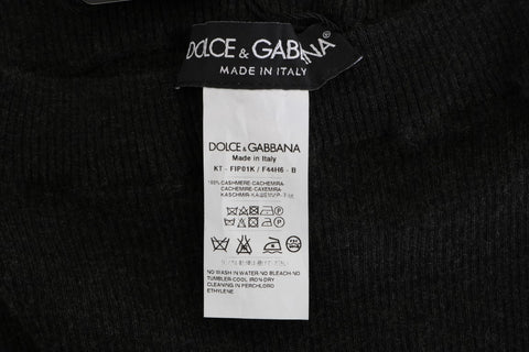 Gray cashmere ribbed stretch tights by Dolce & Gabbana, close-up showing soft fabric and ribbed texture.