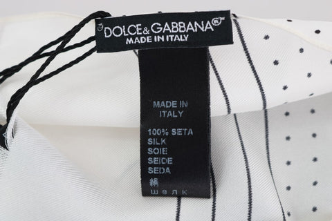 White silk skinny scarf with black polka dots by Dolce & Gabbana, featuring a lightweight, smooth fabric and classic pattern.