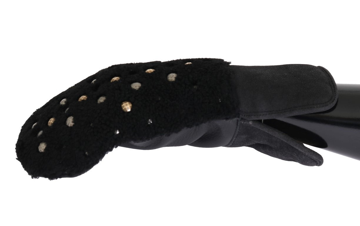 Black leather shearling gloves with studded details by Dolce & Gabbana, showing close-up of textured leather and metal studs.