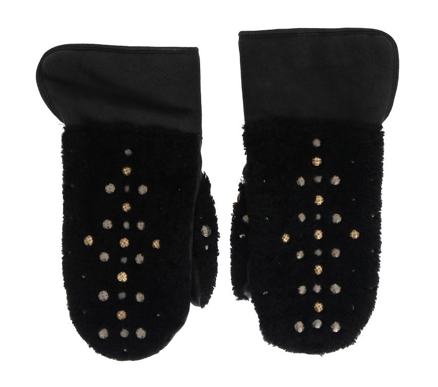 Black leather shearling studded gloves by Dolce & Gabbana with metal stud details and cozy shearling lining.
