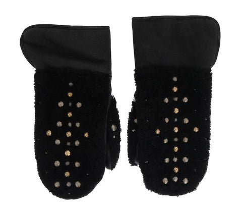 Black leather shearling studded gloves by Dolce & Gabbana with metal stud details and cozy shearling lining.