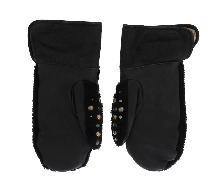 Black leather shearling studded gloves by Dolce & Gabbana with metal stud accents and cozy shearling lining.