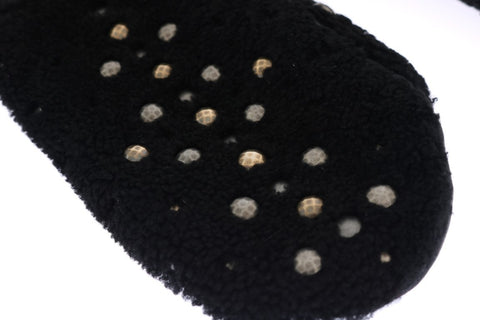 Black leather shearling studded gloves by Dolce & Gabbana, featuring a stylish design with metal stud accents and cozy shearling lining.
