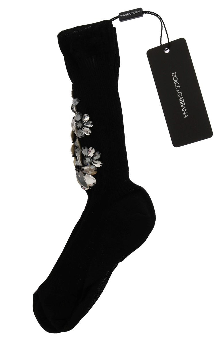 Black knitted floral crystal socks by Dolce & Gabbana featuring intricate floral patterns and clear crystal accents.
