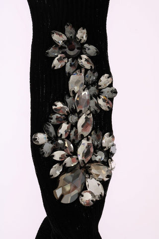 Black knitted floral socks with clear crystals from Dolce & Gabbana, featuring intricate floral patterns and a textured knit design.