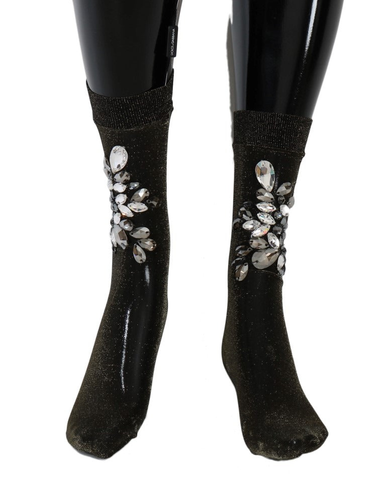 Black stretch floral crystal socks by Dolce & Gabbana with clear crystals and floral pattern, close-up view of the stylish hosiery.