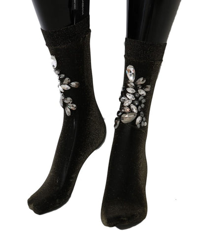 Black floral clear crystal socks by Dolce & Gabbana, featuring stretch fabric and decorative floral patterns with crystal accents.