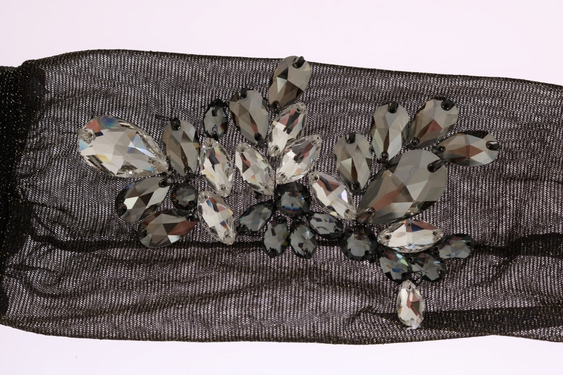 Black stretch floral clear crystal socks by Dolce & Gabbana with intricate floral patterns and shimmering crystal accents.