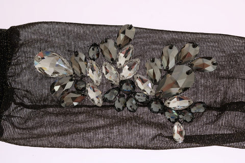 Black stretch floral clear crystal socks by Dolce & Gabbana with intricate floral patterns and shimmering crystal accents.