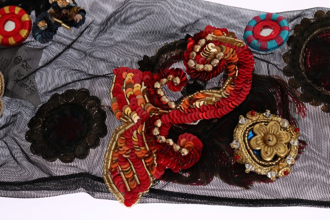 Black stretch Carretto crystal socks by Dolce & Gabbana with intricate pattern and subtle sheen, close-up view.