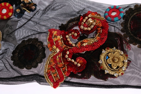 Black stretch Carretto crystal socks by Dolce & Gabbana with intricate pattern and subtle sheen, close-up view.