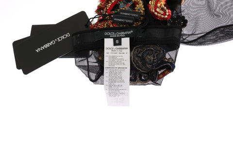 Black stretch Carretto crystal socks by Dolce & Gabbana, featuring intricate pattern and embellishments, displayed on a neutral background.