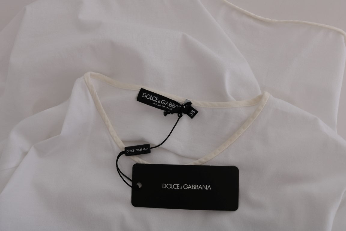 White cotton silk T-shirt by Dolce & Gabbana displayed on a hanger, showcasing its soft fabric and sleek design.