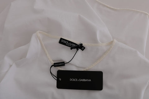 White cotton silk T-shirt by Dolce & Gabbana displayed on a hanger, showcasing its soft fabric and sleek design.