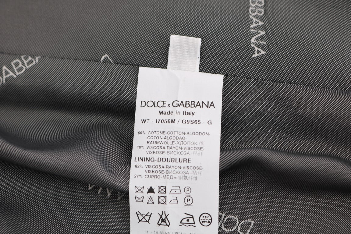 Gray STAFF Cotton Rayon vest by Dolce & Gabbana, featuring a tailored fit and stylish design, shown on a model.