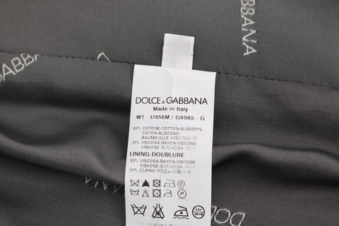 Gray STAFF Cotton Rayon vest by Dolce & Gabbana, featuring a tailored fit and stylish design, shown on a model.