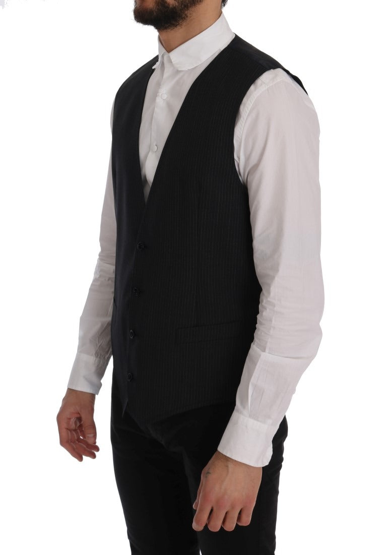 Gray wool stretch vest by Dolce & Gabbana, close-up of the fitted sleeveless vest with textured fabric and subtle branding details.
