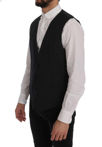 Gray wool stretch vest by Dolce & Gabbana, close-up of the fitted sleeveless vest with textured fabric and subtle branding details.