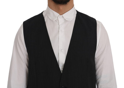 Gray wool stretch vest from Dolce & Gabbana, close-up of the fitted sleeveless vest showing textured fabric and tailored design.