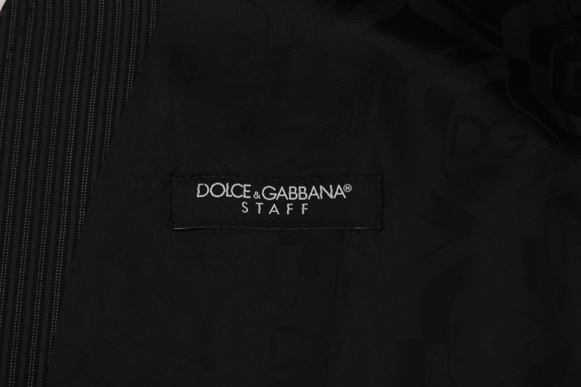 Gray wool stretch vest by Dolce & Gabbana, tailored fit with textured fabric and subtle detailing.