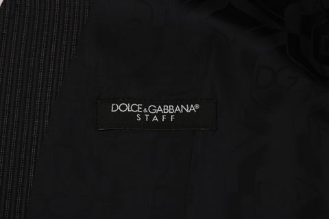 Gray wool stretch vest by Dolce & Gabbana, tailored fit with textured fabric and subtle detailing.