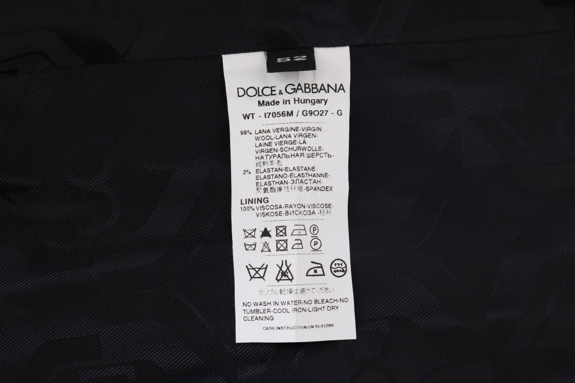 Gray wool stretch vest by Dolce & Gabbana, featuring a fitted design and classic sleeveless cut.