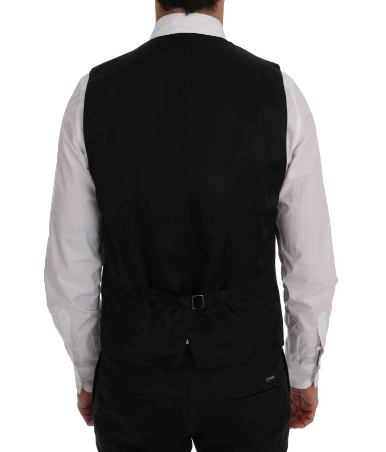 Blue wool stretch vest by Dolce & Gabbana, featuring a fitted design and soft fabric texture.