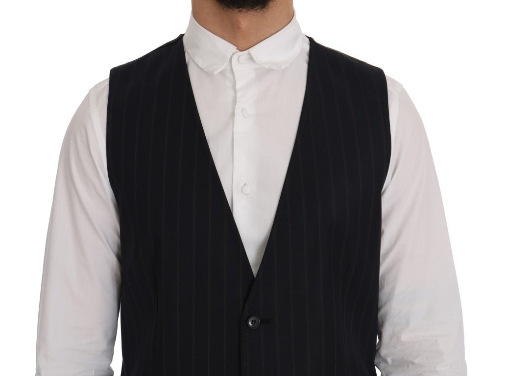 Blue wool stretch vest by Dolce & Gabbana, featuring a fitted design and textured fabric, displayed on a neutral background.