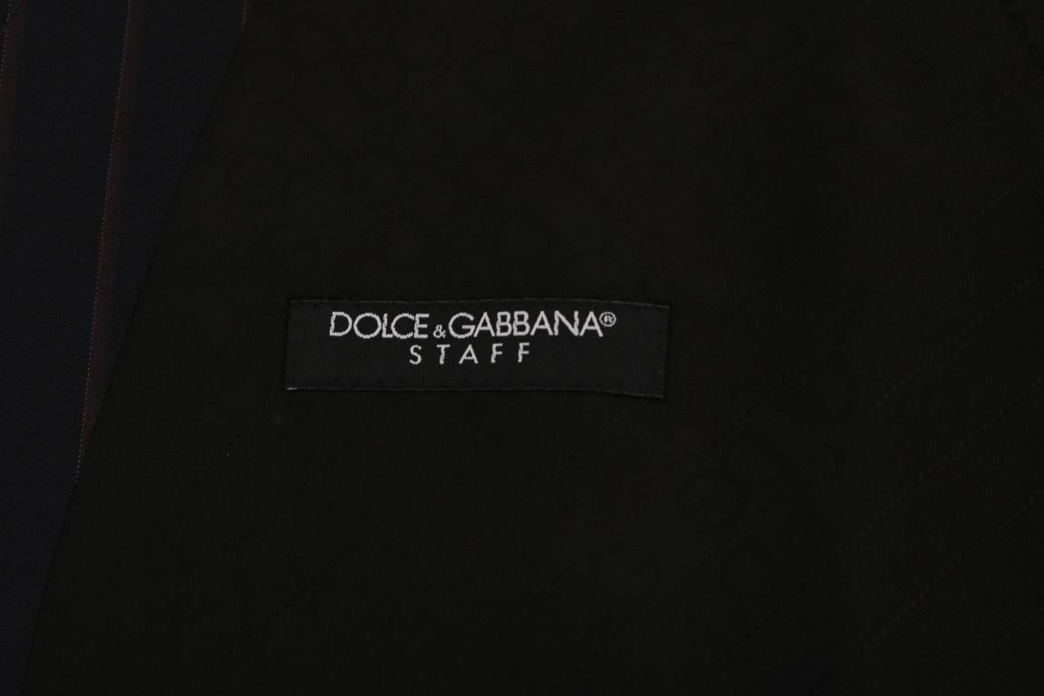 Blue wool stretch vest by Dolce & Gabbana, close-up of fitted vest showing textured fabric and sleek design.