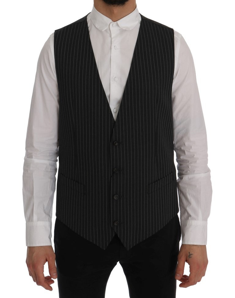 Gray wool stretch vest by Dolce & Gabbana, close-up of textured fabric and tailored fit on a mannequin.