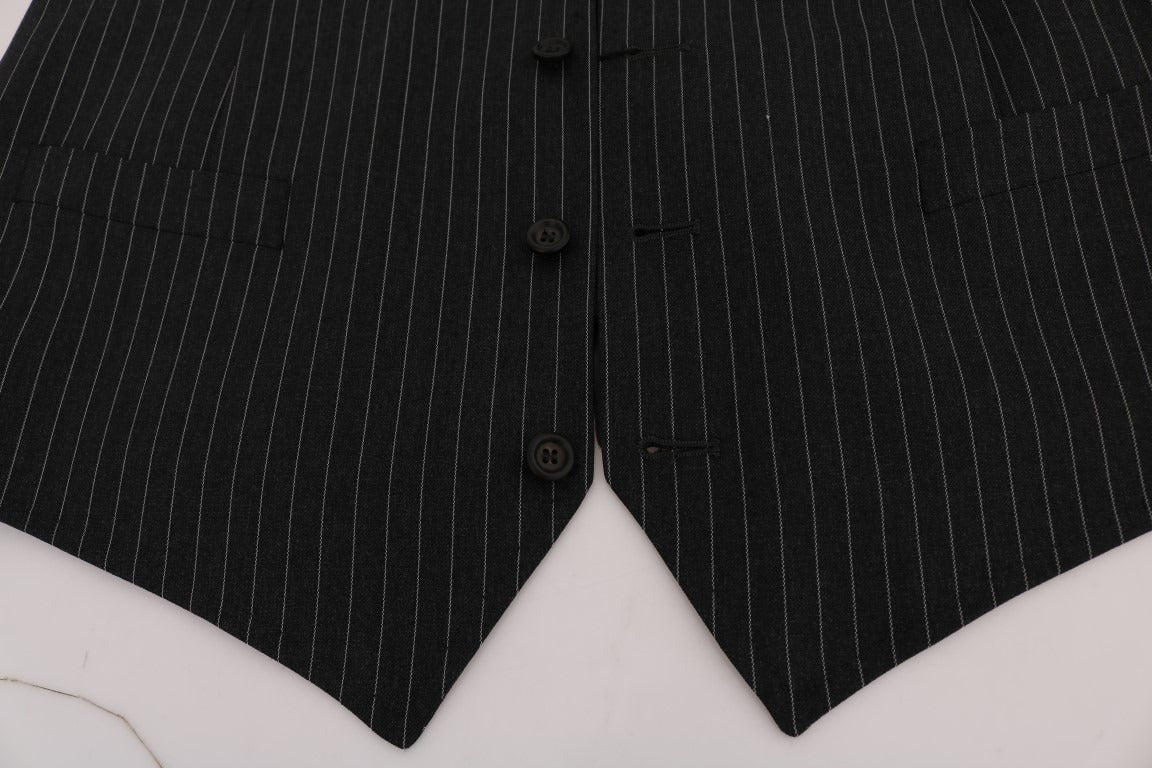 Gray wool stretch vest by Dolce & Gabbana, close-up showing fitted sleeveless design and soft textured fabric.