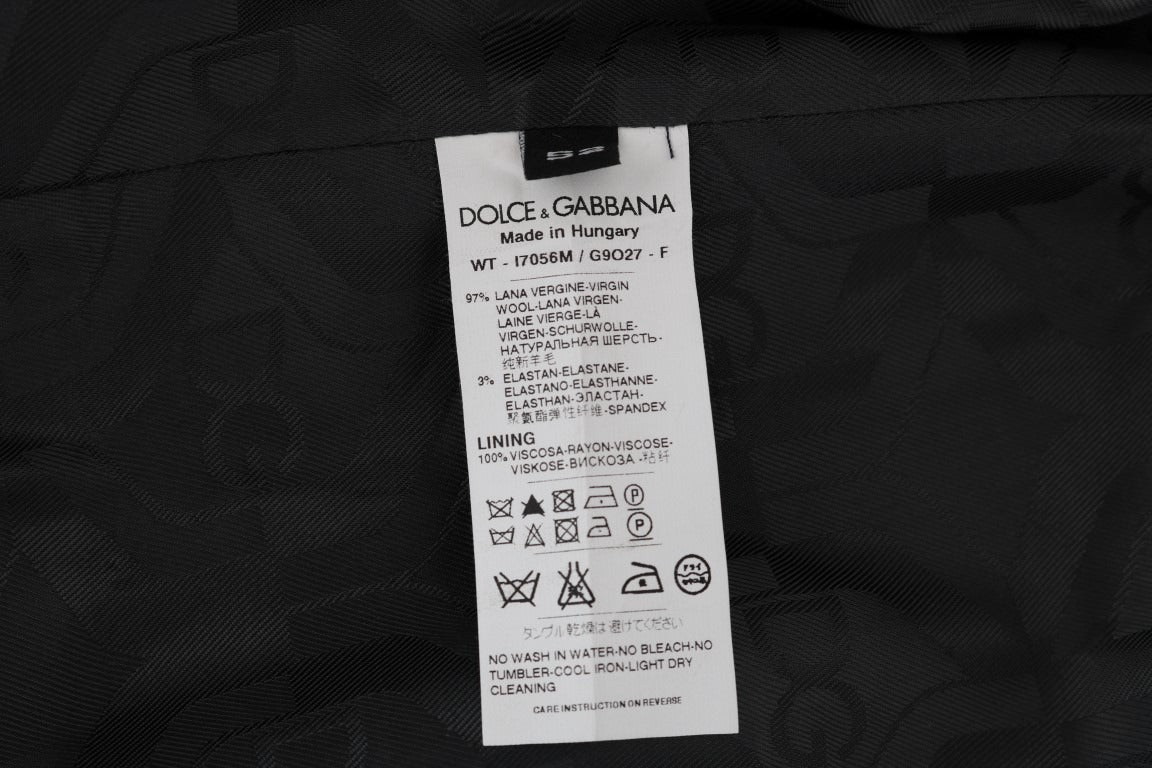 Gray wool stretch vest by Dolce & Gabbana, featuring a fitted design and textured fabric, shown on a plain background.