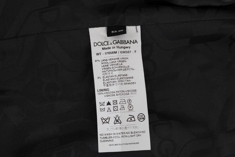 Gray wool stretch vest by Dolce & Gabbana, featuring a fitted design and textured fabric, shown on a plain background.