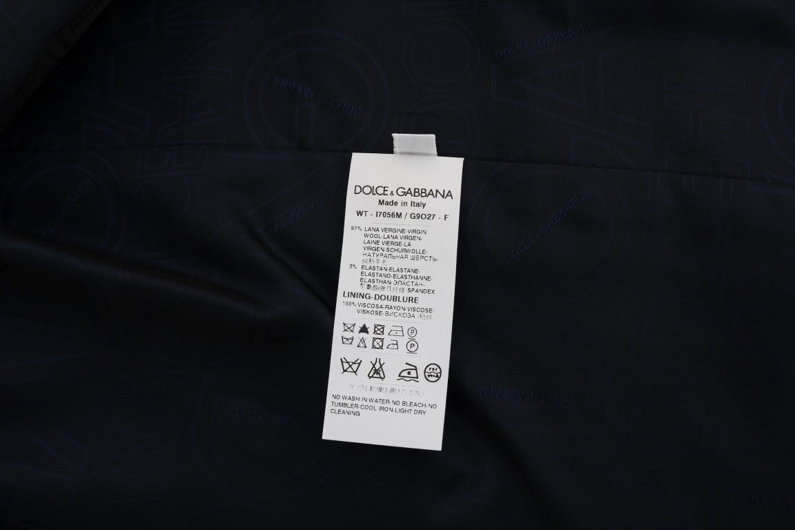 Blue wool stretch vest by Dolce & Gabbana featuring a fitted design and subtle texture details.