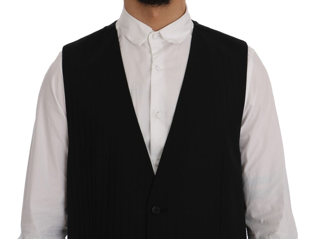Black STAFF wool stretch vest by Dolce & Gabbana, close-up of fitted vest with textured wool fabric and sleek design.