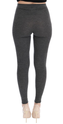 Gray cashmere stretch tights by Dolce & Gabbana displayed on a model, showcasing the soft, fitted fabric and stylish design.