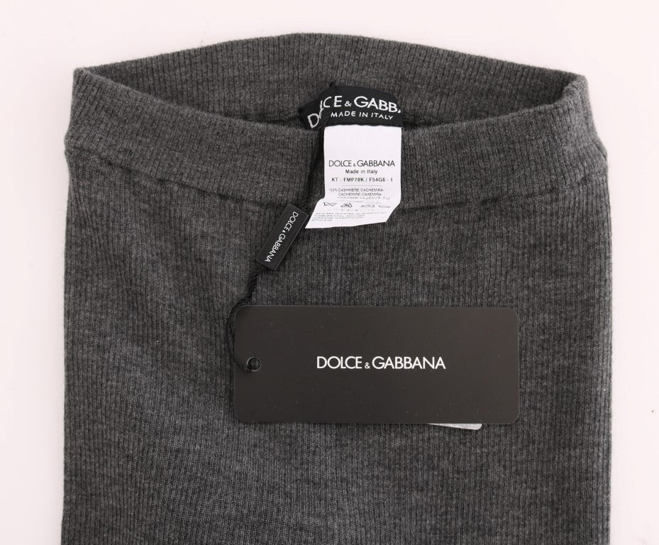 Gray Dolce & Gabbana cashmere stretch tights laid flat, showing their smooth fabric and snug fit design.