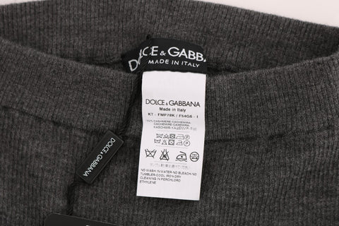 Gray cashmere stretch tights by Dolce & Gabbana, close-up of soft, fitted hosiery fabric showing texture and elasticity.