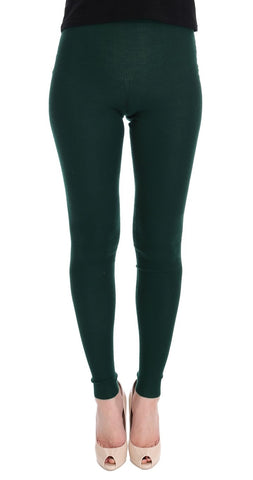 Green cashmere stretch tights by Dolce & Gabbana, close-up of soft, fitted fabric with a smooth, luxurious texture.