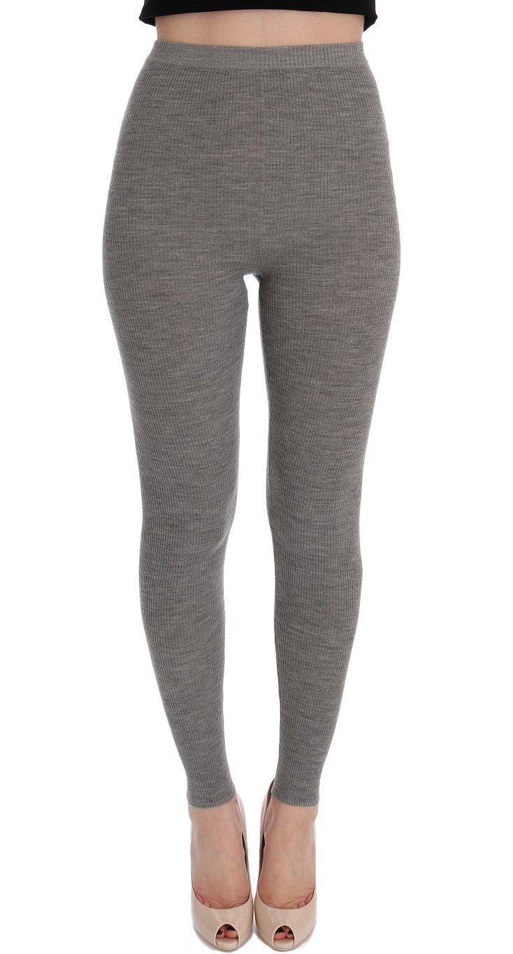 Gray cashmere stretch tights from Dolce & Gabbana, close-up view showing soft knit fabric and fitted design.