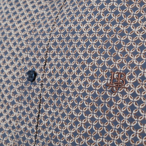 Harmont & Blaine jeans from Jag Couture London with classic blue denim, visible stitching, and metal button closure.