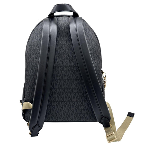 Michael Kors black handbag with sleek design, featuring gold-tone accents and structured shape, from Jag Couture London - New York.
