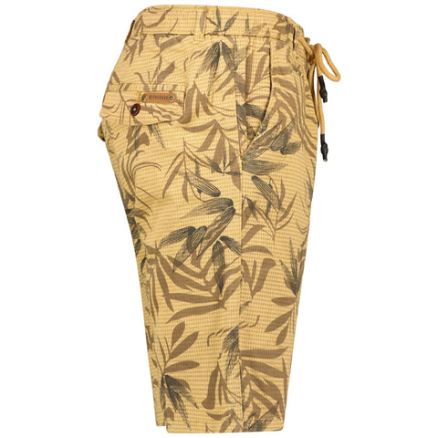 Beige Geographical Norway SW1626H jacket featuring a stylish design, displayed in a natural outdoor setting.