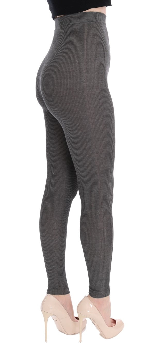 Gray Dolce & Gabbana cashmere stretch tights displayed on a model, showcasing the soft, fitted fabric and elegant design.