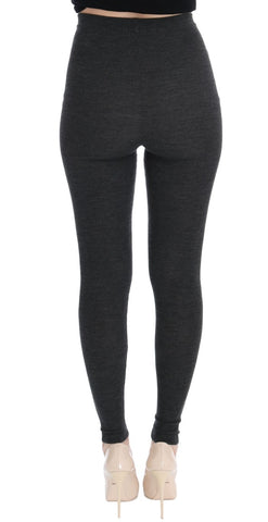 Gray wool stretch tights by Dolce & Gabbana, close-up showing soft fabric and snug fit on model's legs.